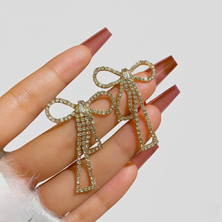 PQT-985 Touch Of Glamour To Your Look With These Bow Shape Zircon Korean Earrings – Color Golden