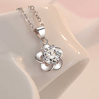 Plum Blossom Pendant Necklace with White Diamond Flower Design